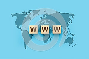 WWW World Wide Web on block letters. World map on blue background. WWW with global map
