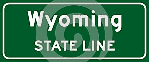 Wyoming state line road sign