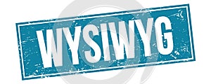 WYSIWYG text on blue grungy rectangle stamp