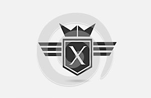 X alphabet letter logo icon for company in black and white. Creative badge design with king crown wings and shield for business