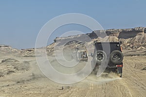 4x4 car on sand road in the canyons of the Namibe Desert. Africa. Angola photo