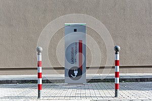 & x22;Charging station for electric cars& x22; written in German in the st