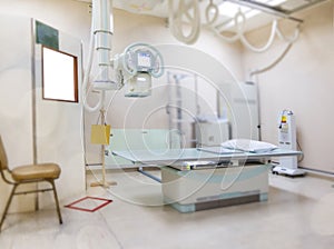 X-ray generator tube with monitor  or X-ray general device with Bucky stand in radiology .modern medical equipment in the hospital