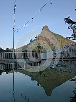 & x22;Scenery of a swimming pool and a rocky mountain in a resort area in Jonggol, Bogor, West Java, Indonesia.& x22; photo