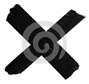X symbol made of black masking tape isolated on white background