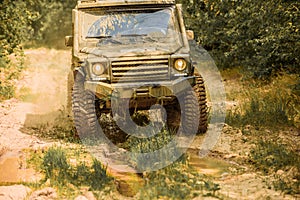 4x4 travel trekking. Off road sport truck between mountains landscape. Jeep outdoors adventures. Travel concept with big