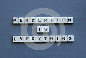 ' Perception Is Everything ' word made of square letter word on grey background