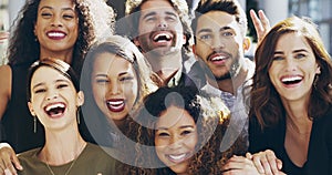 We're positive about business. Cropped shot of a group of happy businesspeople standing in their workplace lobby.