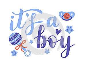 It's a boy, lettering written with elegant calligraphic font and decorated with rattle, dummy. Gender party concept.