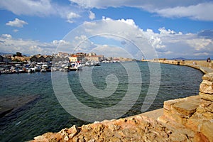 Xania, Crete, October 01 2018 Panoramic view of the city with tourists of various nationalities visiting the walls of the Venetian