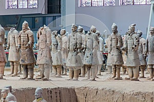 XI& x27;AN, CHINA - AUGUST 6, 2018: Terracotta scultpures in the Pit 1 of the Army of Terracotta Warriors near Xi& x27;an, Shaanxi
