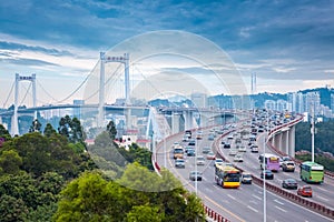 Xiamen haicang bridge at dusk with busy traffic