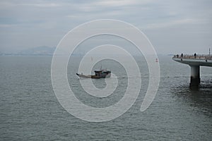Xiamen Yanwu Sea-Crossing Bridge and boat