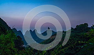 Xianggong Hill viewpoint view of Yangshuo landscape at dusk