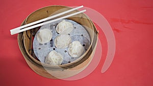 Xiao long bao or steamed pork and soup bun or dim sum.It is steamed chinese food