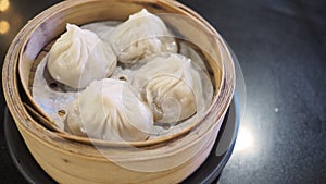 Xiao long bao or steamed pork and soup bun or dim sum.It is steamed chinese food