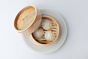 xiaolongbao Chinese steamed bun mantou dumpling on wooden table
