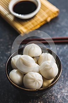 Xiaolongbao, traditional steamed dumplings. Xiao Long Bao buns in bowl