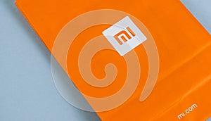 Xiaomi logo on an orange background
