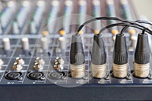 XLR connectors on the audio mixers.