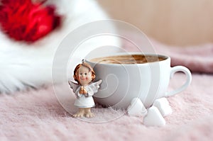 Xmas angel on the fluffy table