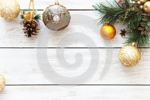 Xmas balls on merry Christmas tree, happy new year card decoration on white wooden background, top view, copy space