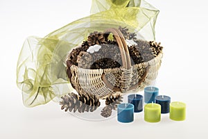 Xmas basket with cone and candle