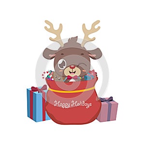 Cute reindeer in Christmas goodie bag photo