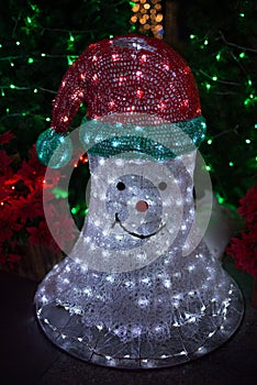 Xmas illuminated neon snowman with santa hat