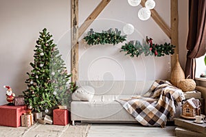 Xmas in morning living room. Sofa bed In christmas Interior. celebrate the new year and holidays. Christmas tree and