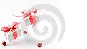 Xmas sale. White gifts with red ribbon and New Year balls in Christmas decoration on white background for greeting card. Xmas