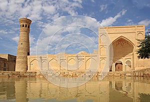 Xoja Kalon Minaret and Xoja Kalon Mosque in Bukhara city, Uzbekistan photo