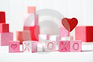 XOXO message with pink and red blocks photo