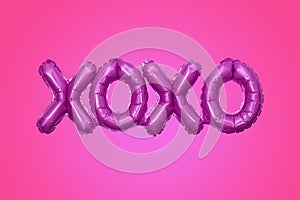 XOXO party balloon on pink