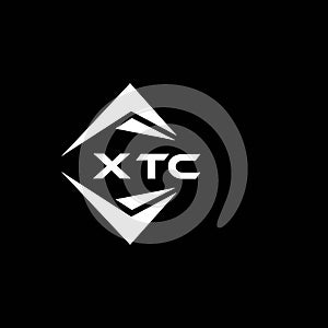 XTC abstract monogram shield logo design on black background. XTC creative initials letter logo