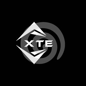 XTE abstract monogram shield logo design on black background. XTE creative initials letter logo