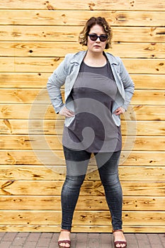 Xxl plus-size woman portrait city street Casual style