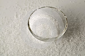 Xylitol sweetener - sugar substitute - crystals in a glass bowl