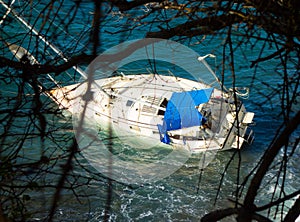 A yacht aground on a reef in the caribbean