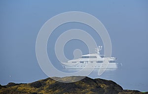 Yacht Anchored in the fog in Casco Bay