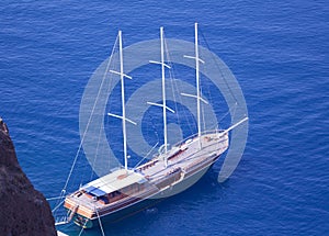 Yacht anchored to shore in Greece, Santorini Island