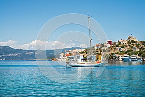 Yacht in bay of Kastelorizo island, Dodecanese, Greec photo