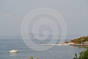 Yacht on beautiful tropical sea bay. Scenic landscape with mountain islands and blue lagoon on Aegean sea. Exotic scenery. Popular