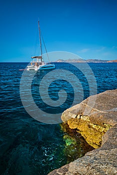 Yacht boat at Sarakiniko Beach in Aegean sea, Milos island , Greece