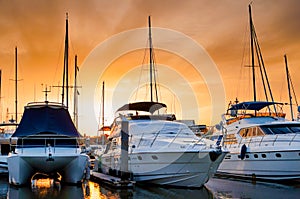 Yacht and boats docking at the marina in the evening