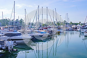 Yacht and boats in a little port at the marina