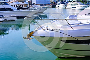 Yacht and boats in a little port at the marina