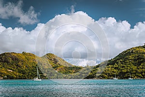 Yacht boats near an uninhabitable island near Victoria city, Mahe, Seychelles