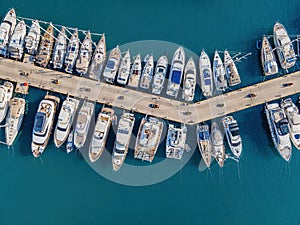 Yacht club. Aerial top-down view of docked sailboats