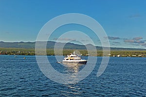 Yacht cruising in the ocean near Galapagos islands